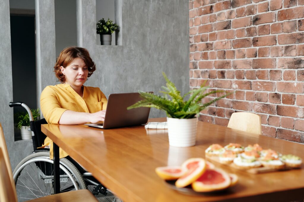 busy professional woman has working lunch at laptop